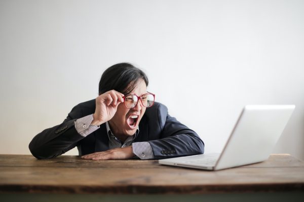 Man screams at computer