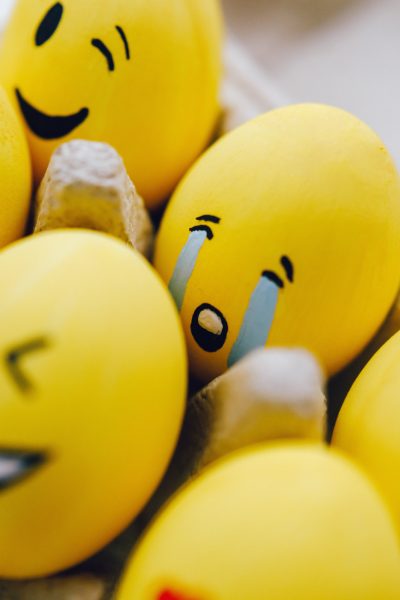 Eggs with emotional faces painted on them